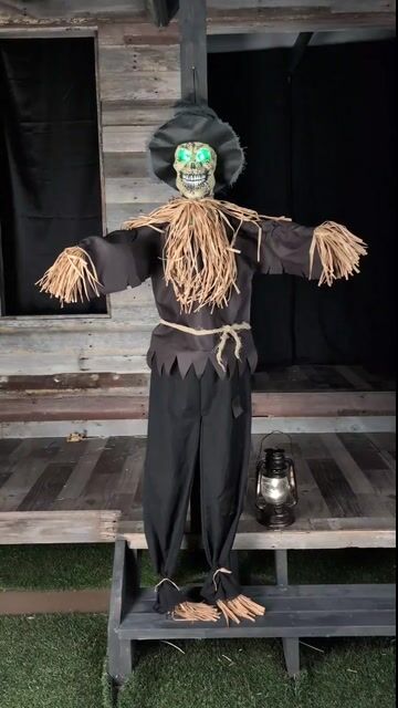 Bring a chilling harvest vibe to your haunted display with this 67-Inch Hanging Halloween Scarecrow Decoration. With tattered clothes, a sinister face, and a looming presence, this eerie scarecrow is more likely to scare off guests than crows!