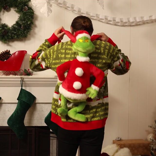 Carry a little holiday mischief with you wherever you go with the Dr. Seuss Santa Grinch Plush Backpack! Featuring the Grinch in his festive Santa outfit, this playful backpack is both functional and fun, making it the perfect accessory for fans of the classic Christmas tale.