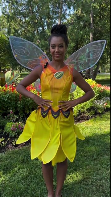 Shine as bright as the sun in this Women's Disney Fairies Iridessa Costume! Channel the power of light with this enchanting outfit inspired by the radiant fairy from Disney's Tinker Bell series.