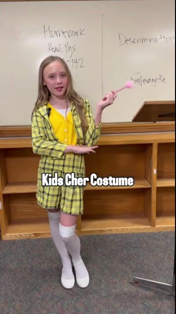 Let your little fashionista channel her inner 90s icon with the Clueless Cher Costume for Girls! This trendy outfit captures the preppy style of Beverly Hills' most popular teen, making it perfect for Halloween or dress-up fun.