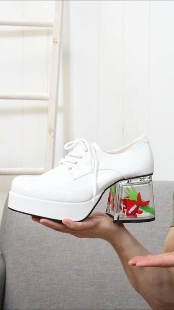 Complete your retro costume with Adult Black Goldfish Pimp Shoes. Get these stylish, bold shoes that are perfect for Halloween, themed events, or unforgettable party looks.