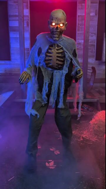 Bring the apocalypse to life with this chilling Animatronic Lumbering Zombie Prop Decoration! With a haunting shuffle, eerie moans, and decayed details, this horrifying figure looks like it just crawled out of a grave. Whether indoors or outdoors, this gruesome zombie is sure to make your Halloween setup look straight out of a horror movie!