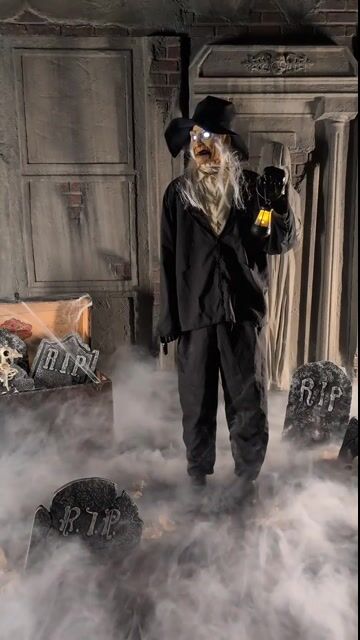 This towering 7FT Ghastly Gravedigger Animatronic Decoration brings haunted cemetery vibes to life! He shuffles, speaks, and stares with glowing eyes—perfect for your Halloween graveyard scene.