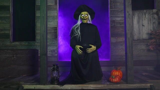Add a magical and mischievous touch to your Halloween night with this exclusive 3.5FT Animated Seated Witch Holding Candy Bowl. Guests will think twice before grabbing a sweet treat!