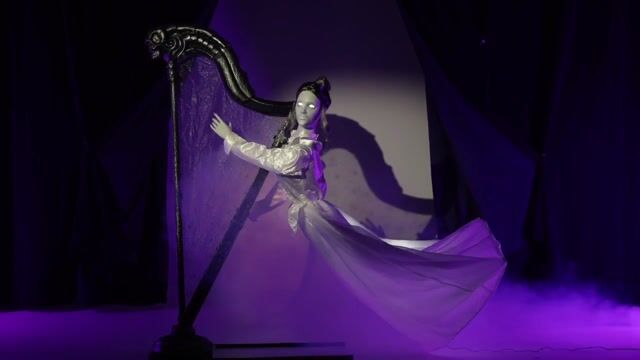 Add a touch of haunted harmony to your décor with Celeste the Restless Ghost. Standing at 5.5 feet tall, this animatronic ghost plays her harp with unsettling grace, her face lighting up as haunting music echoes through the night. A ghostly centerpiece that’s as enchanting as it is eerie.