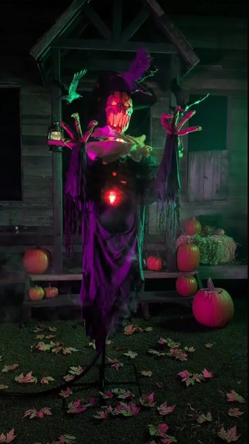 Perch terror in your haunted display with this exclusive Animated Raven Scarecrow Halloween Decoration! This eerie figure combines the unsettling presence of a scarecrow with ominous ravens flying overhead, creating a truly spine-chilling sight.