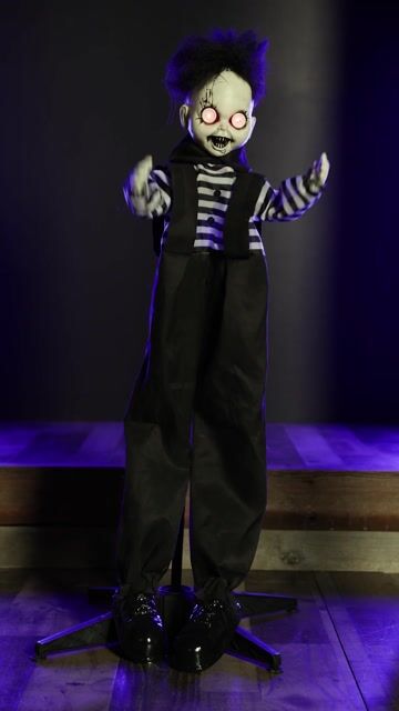 Looking for something that will really make your home feel like a haunted house? This exclusive 3.25FT Emile the Button-Eye Boy Animatronic Decoration will look perfect in every spot in your home. Wait, you didn't put it there. I didn't move it either! Oh..