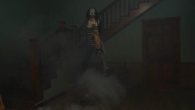 Towering at 7 feet, the Sweet Dreams Clown is no joke—this animatronic nightmare clutches a struggling child prop, moves eerily, and delivers chilling sound effects.
